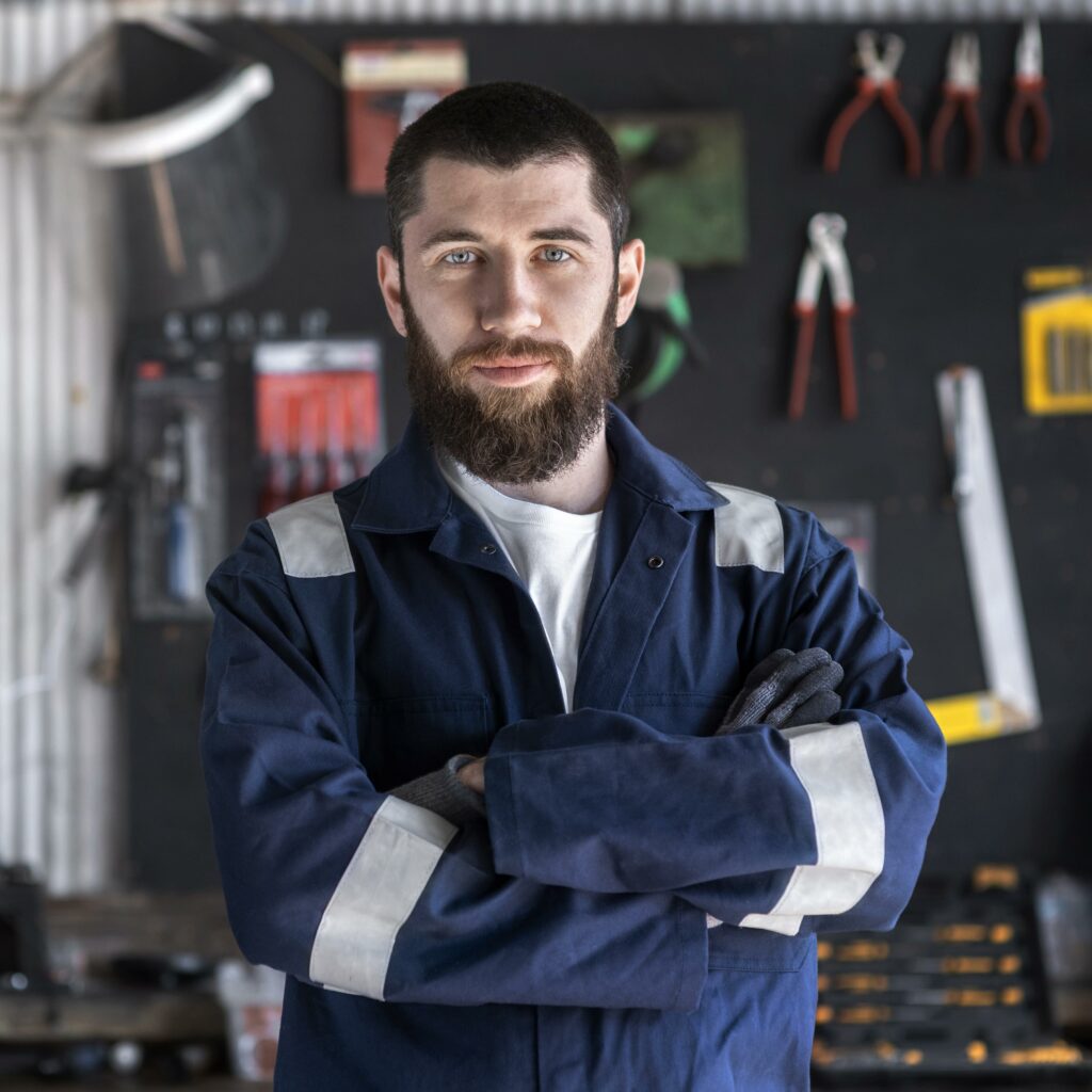 young mechanic working his workshop